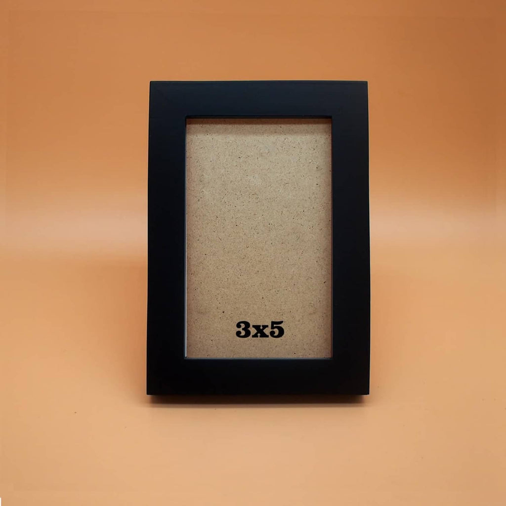 Black 3x5 picture frame with clear acrylic front, tan backing, front display view
