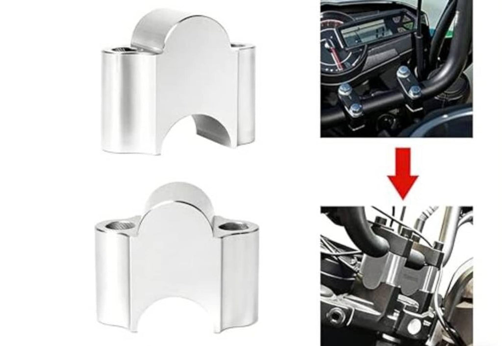 Chrome handlebar riser clamp brackets shown with installed on motorcycle handlebar.