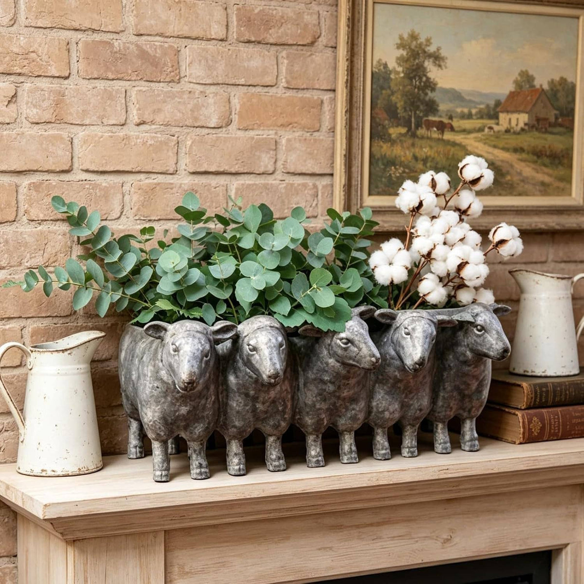 Dark gray resin sheep planter pot on a shelf with white flowers