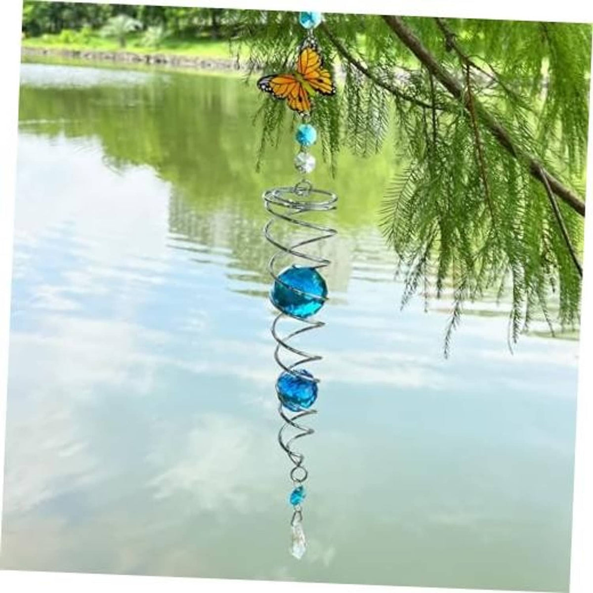 Butterfly wind spinner sun catcher with blue crystal gazing ball spiral and hanging drops