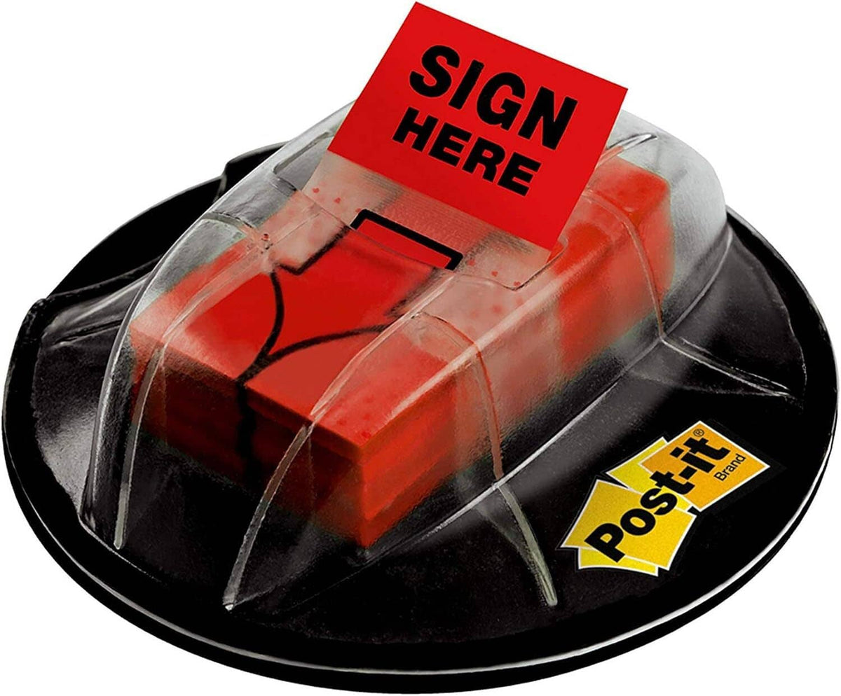 Desktop sticky note dispenser with red notes and black base, label "Sign Here"