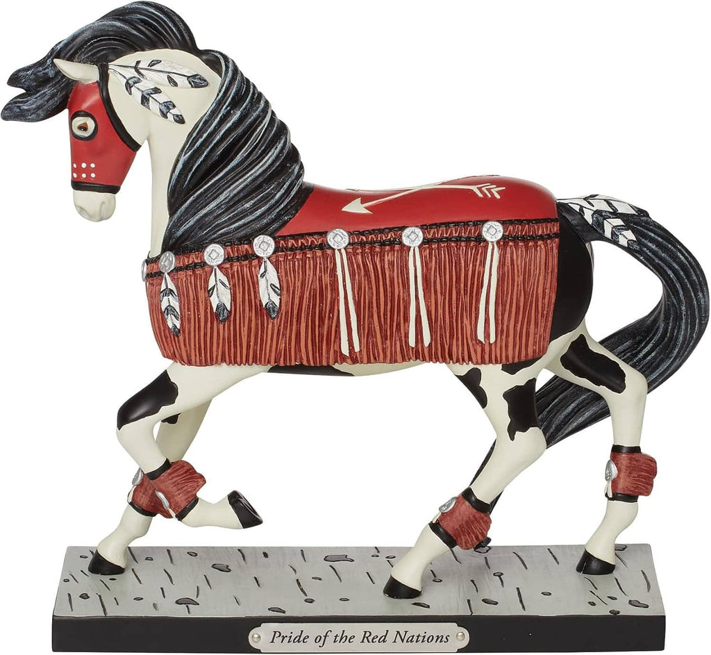 Painted horse figurine straight-on view, red saddle blanket with white fringe, on speckled base