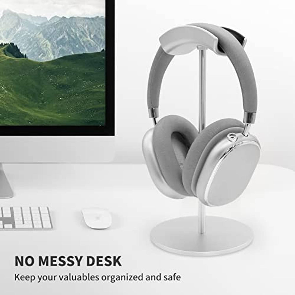 Silver headphone stand holding gray over-ear headphones on a circular base