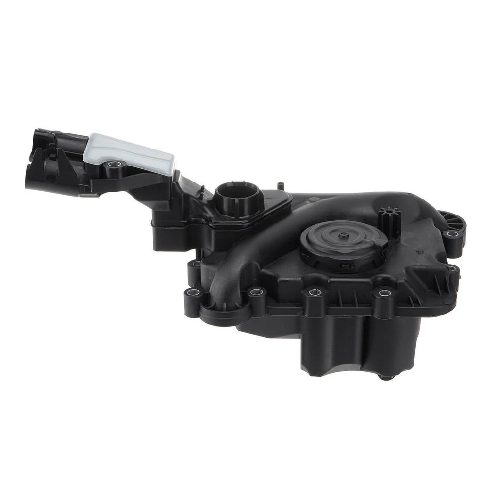 Black oil separator valve module with circular diaphragm cover and vacuum ports.