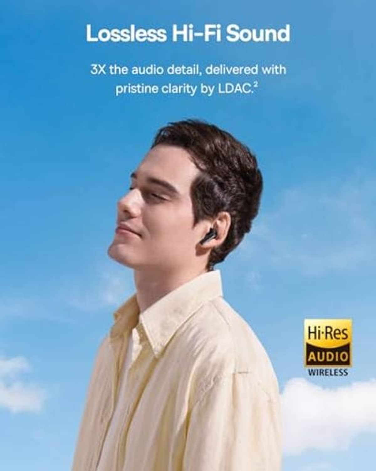 Wireless earbuds in a man’s ear, black stem-style design