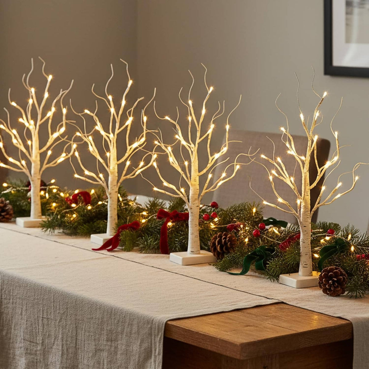 Lighted white birch LED trees with warm white lights on white square bases