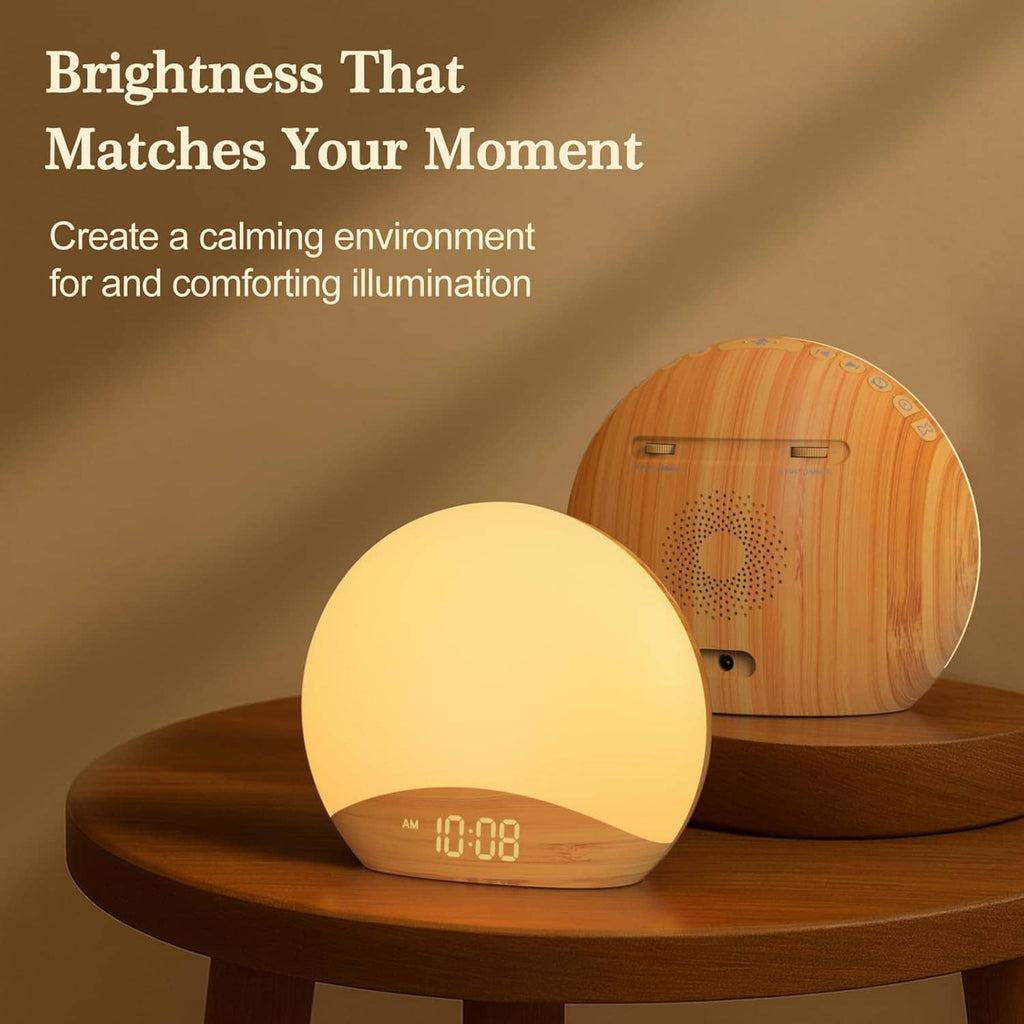 Wood grain sunrise alarm clock with warm glowing dome and digital display