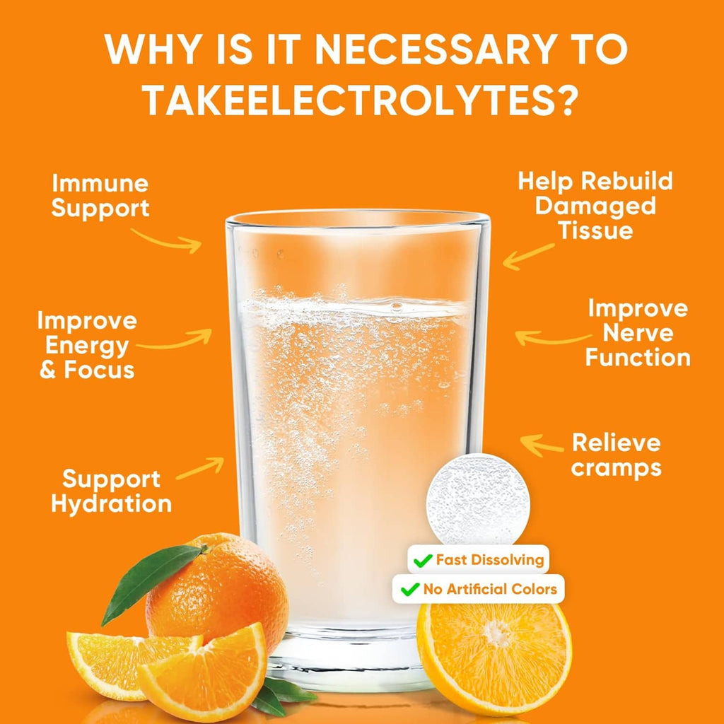 Orange electrolyte drink mix dissolving in water with citrus slices