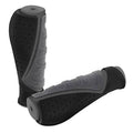 Black rubber bike handlebar grips with perforated texture, ribbed comfort pad, end cap