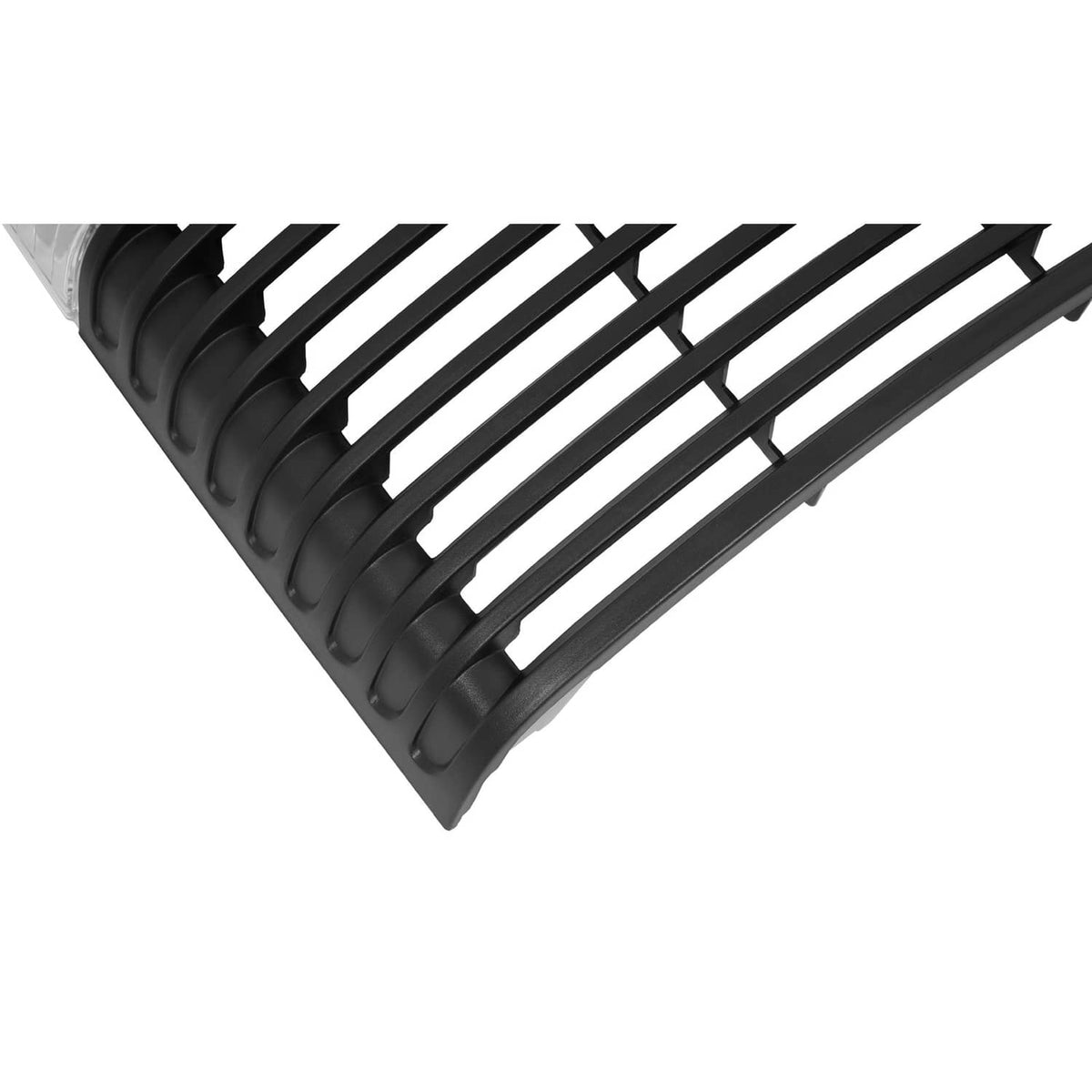 Close-up of black grille slats on a curved front hood grille frame