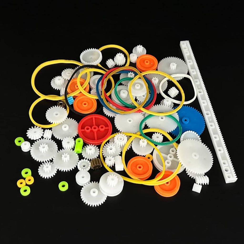 Plastic gear kit with interlocking gears, long white rail, and multi-color belt loops