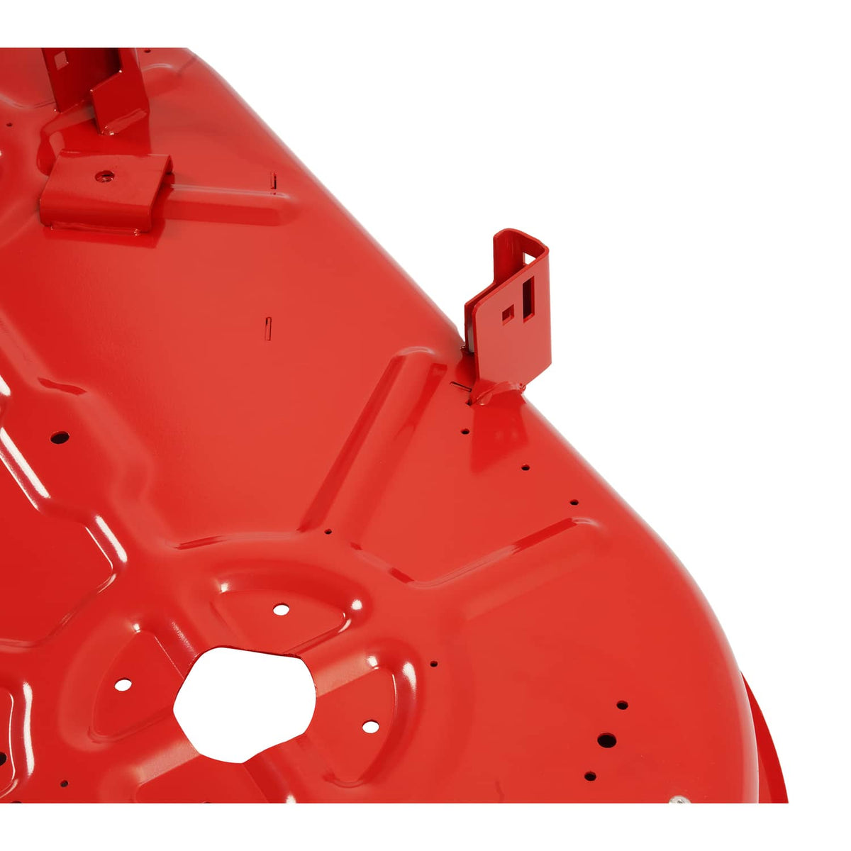 Close-up of red mower deck housing with welded bracket and bolt holes