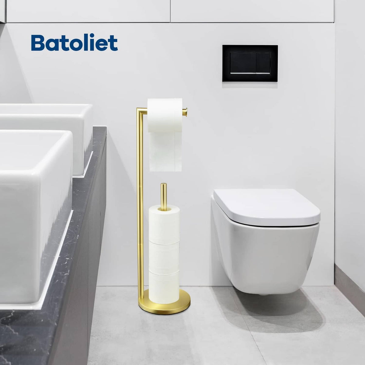 Toilet paper holder stand with gold finish and white base for bathroom roll