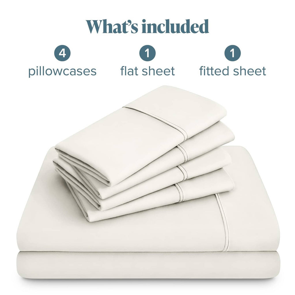 Cream microfiber sheet set stack featuring flat sheet, fitted sheet, and pillowcases