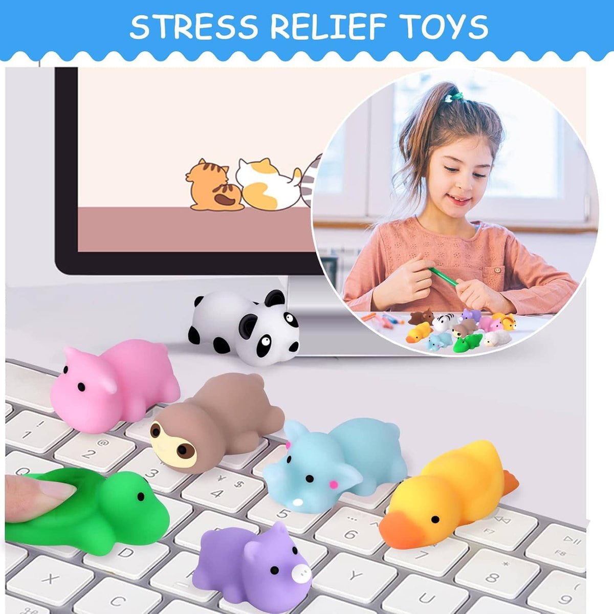 Assorted animal mochi squishy stress toys lined up on a keyboard