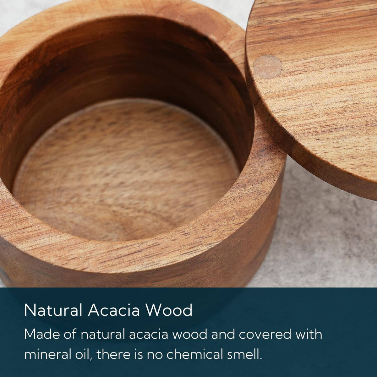 Natural acacia wood salt cellar bowl with open interior and round lid