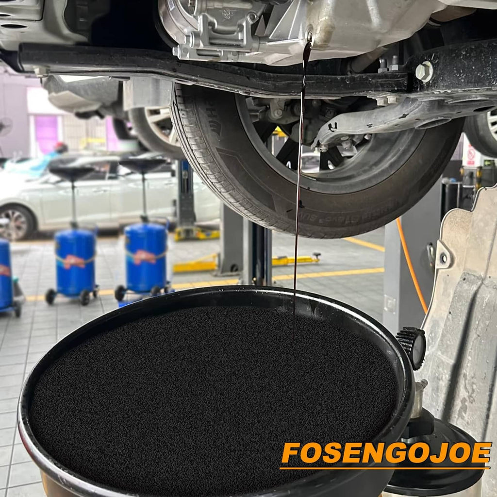 Black round oil drain pad with rim, positioned under the vehicle