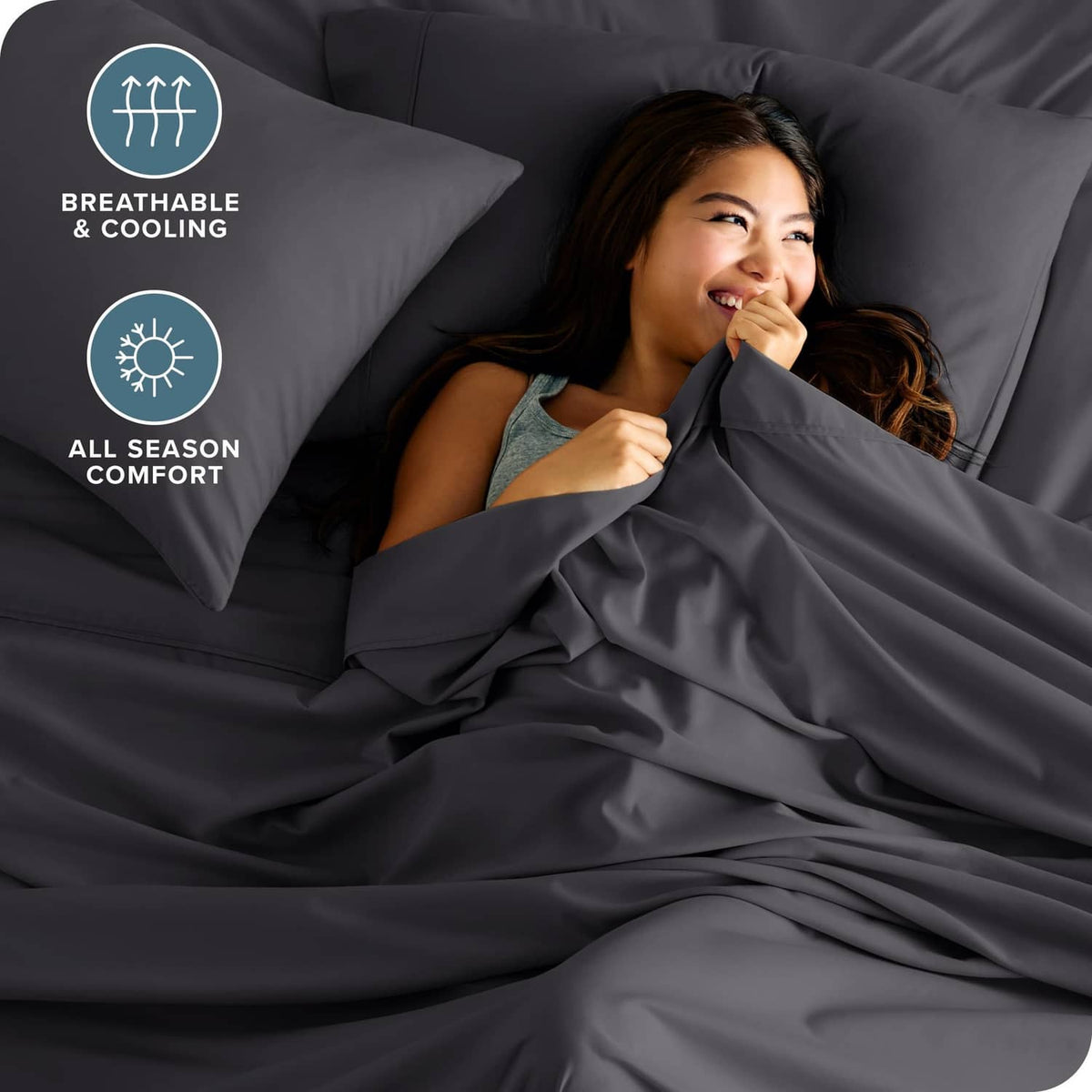 Grey microfiber bedding with smooth drape, ideal for cool comfort on a bed