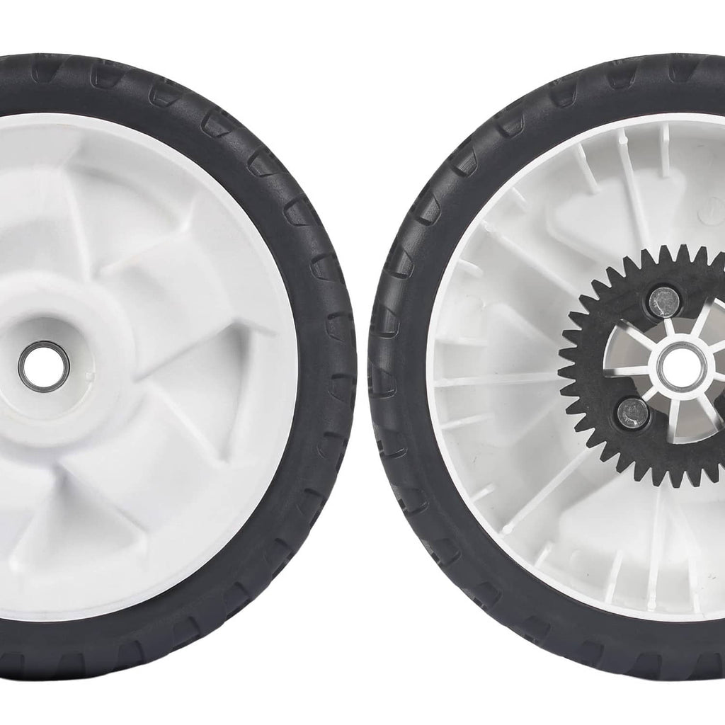 Close-up of two rear replacement wheels with black tires and white rims