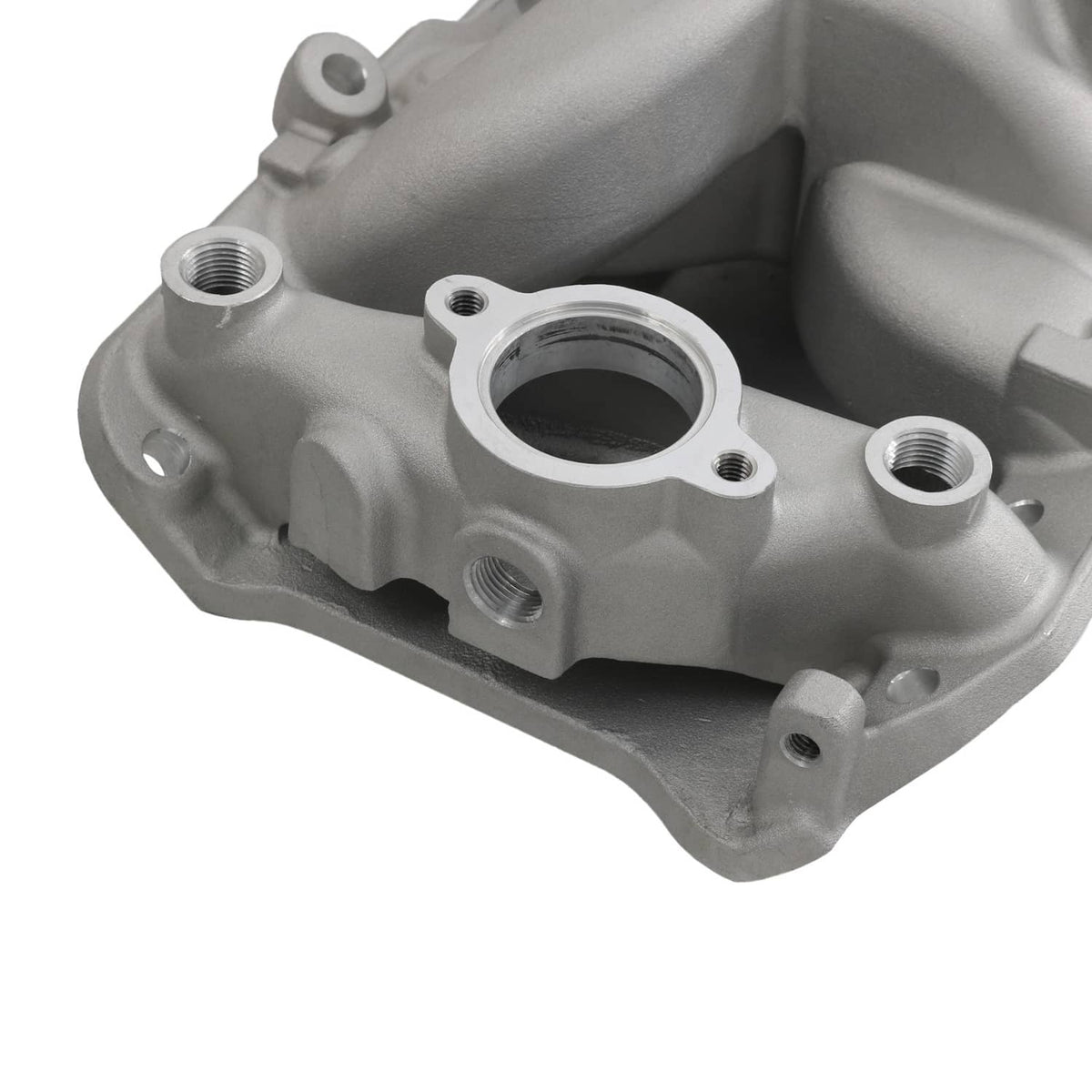 Intake manifold port detail with threaded fittings and circular flange opening