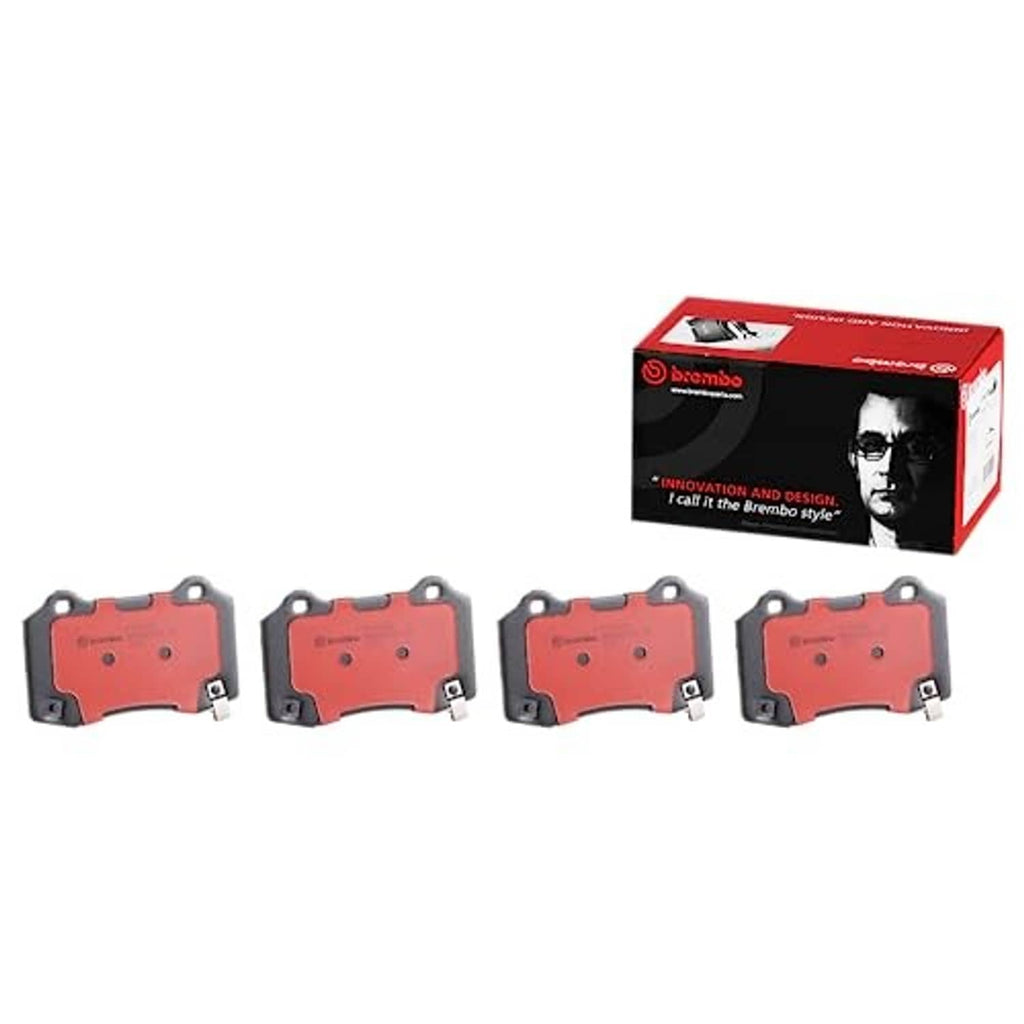 Rear ceramic disc brake pad set, four red friction pads with gray backing plates