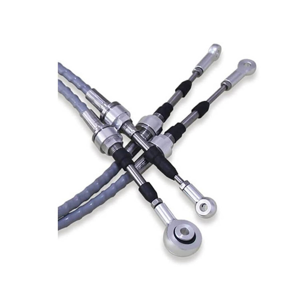 Crossed shifter cable linkage assembly with blue braided cables and silver rods