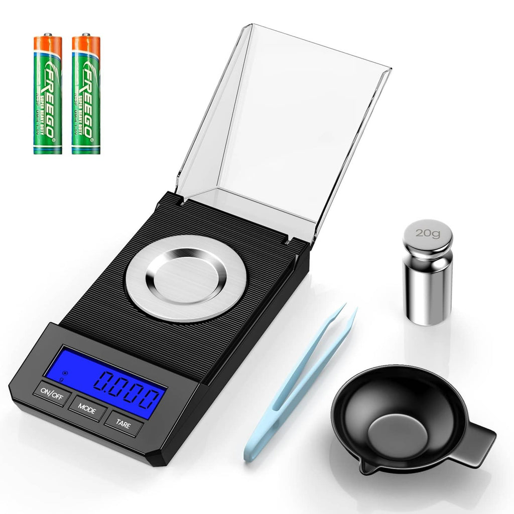 Black digital milligram scale with open lid, round metal pan, and display