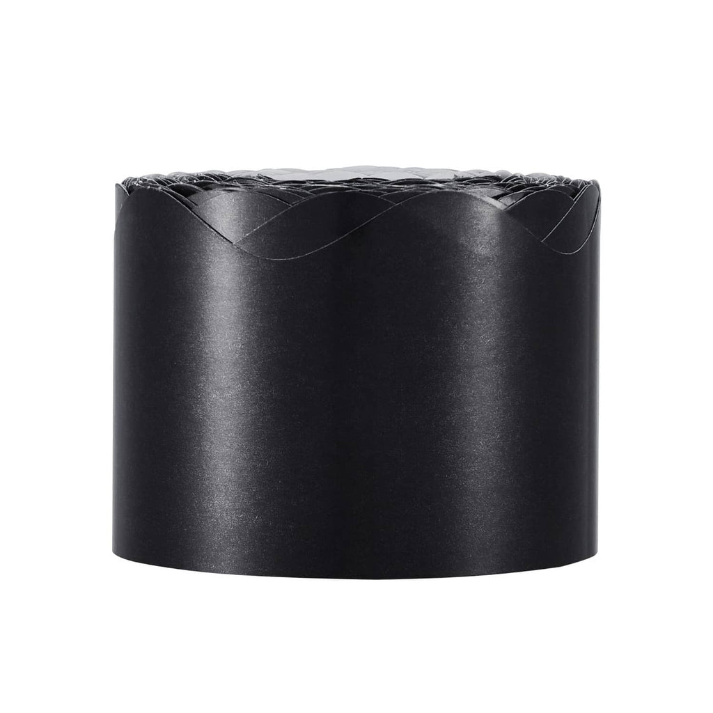 Black rolled scalloped border trim cylinder with coiled layers on top