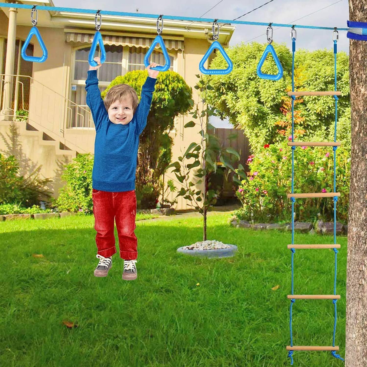 Blue trapeze swing bar rings attached to overhead play structure outdoors