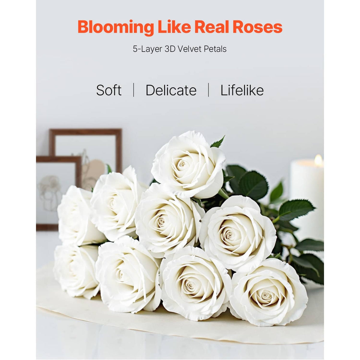 White artificial rose bouquet with green leaves arranged on a tabletop