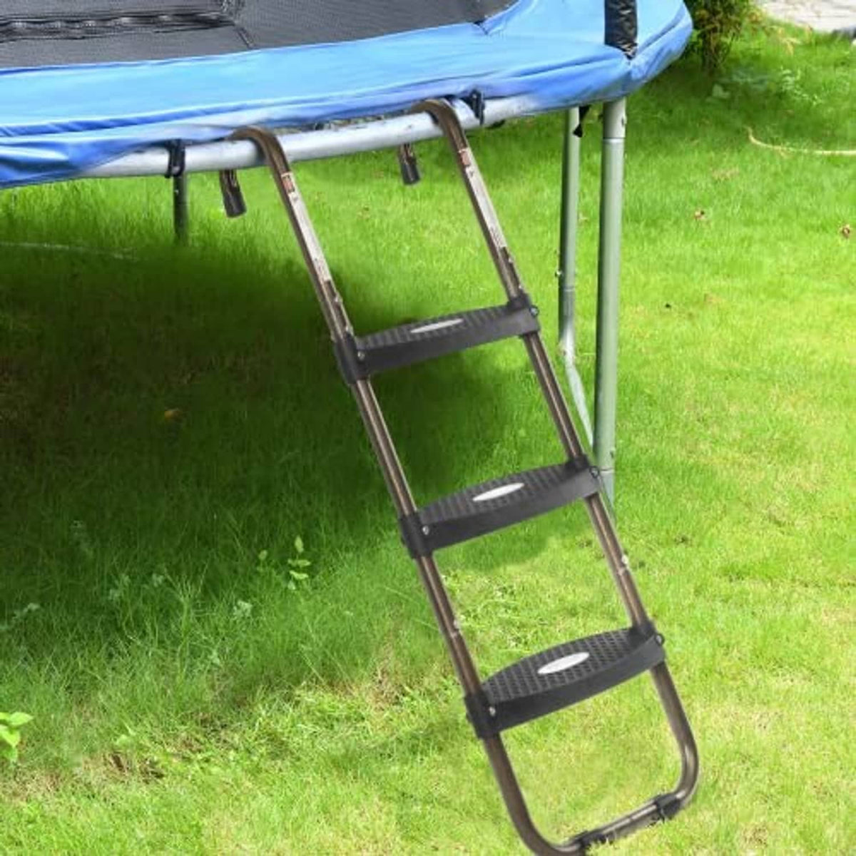 Trampoline ladder attached to frame with three wide skid-proof steps