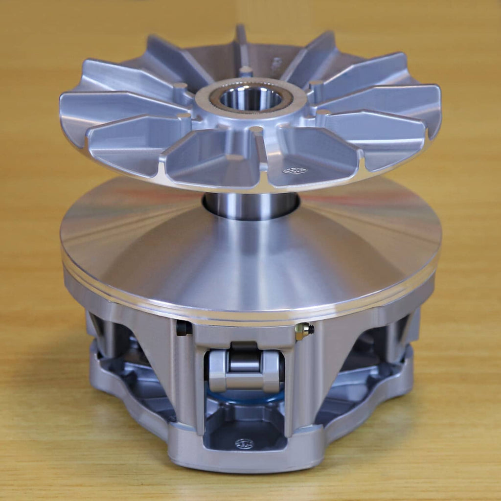 Silver primary drive clutch kit viewed from front, showing center shaft and fins