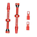 Red Presta valve stem kit with caps, including 55mm valve stem