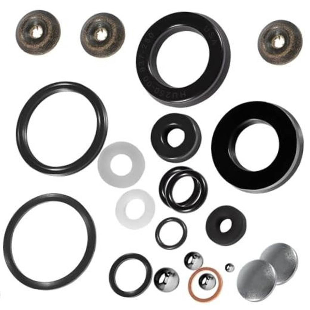 Floor jack seals kit with black and white O-rings, gaskets, washers, and metal caps