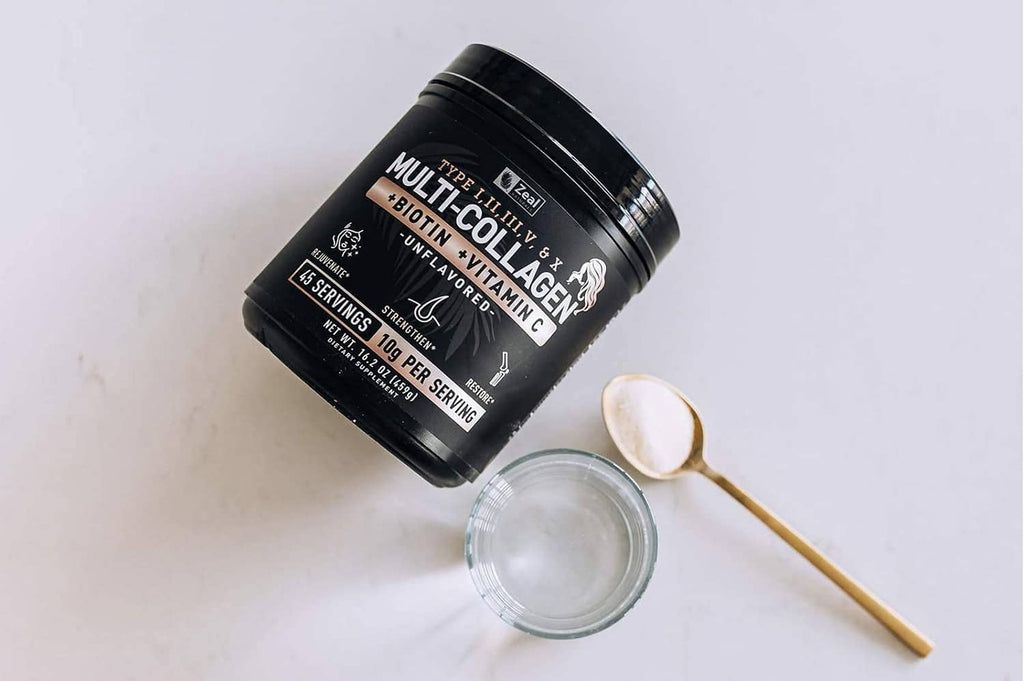 Multi-collagen peptides tub, pictured with measuring scoop and water glass