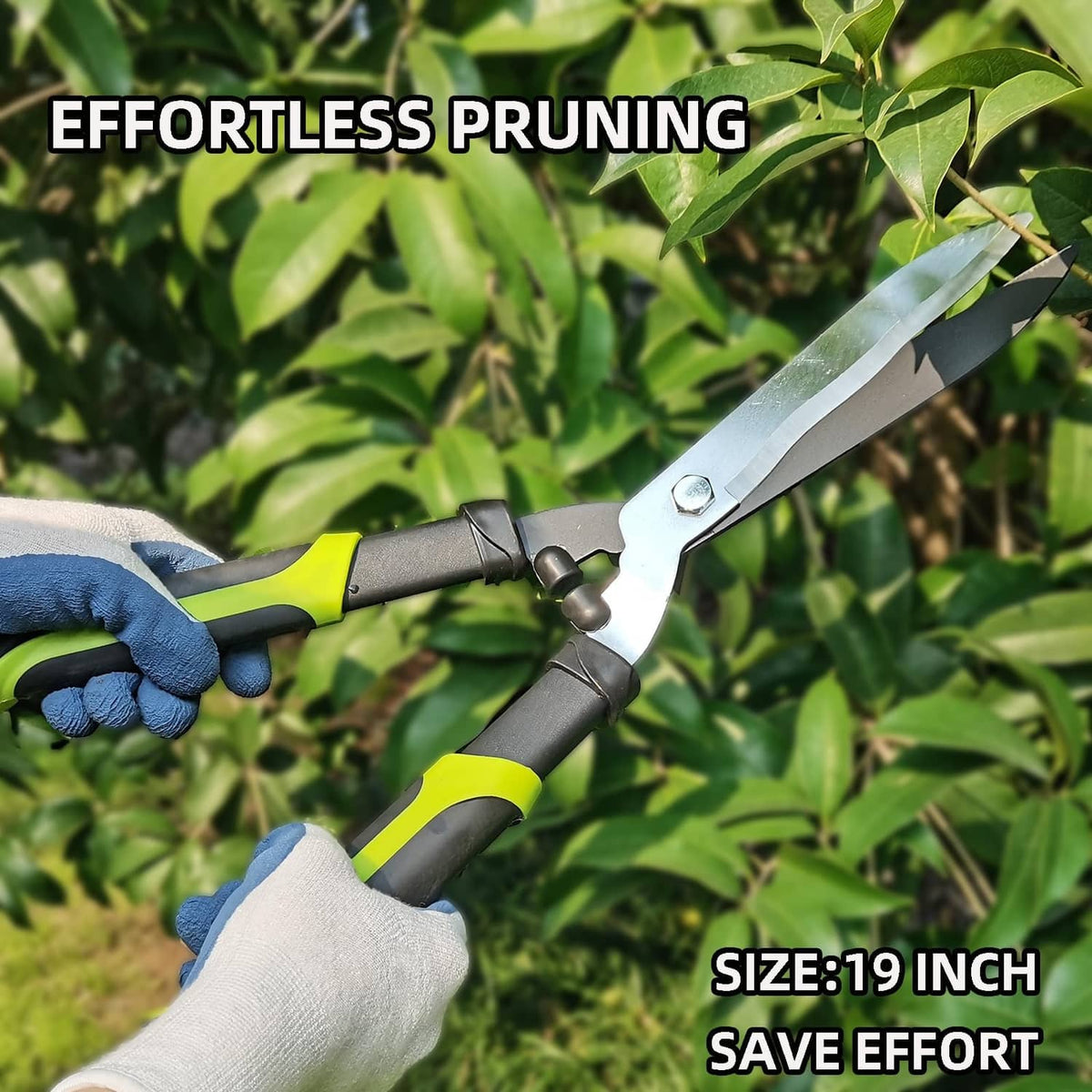 Hedge trimmer with silver blades and green-and-yellow handles, gripped with gloves
