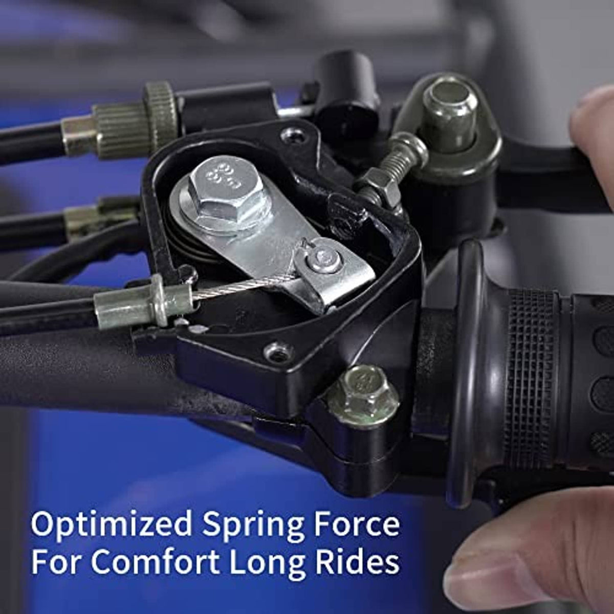 Throttle linkage and spring area on black control housing with cable connections