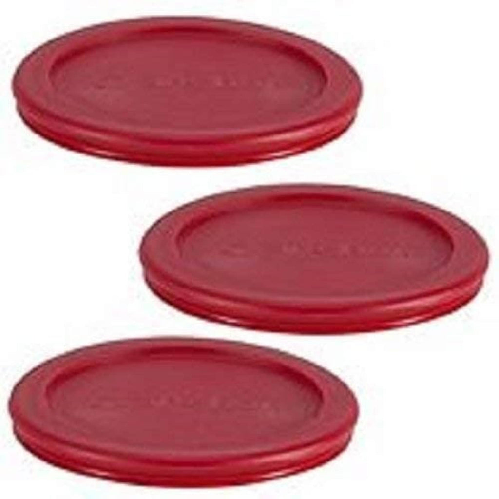 Three red round storage lid caps, close-up