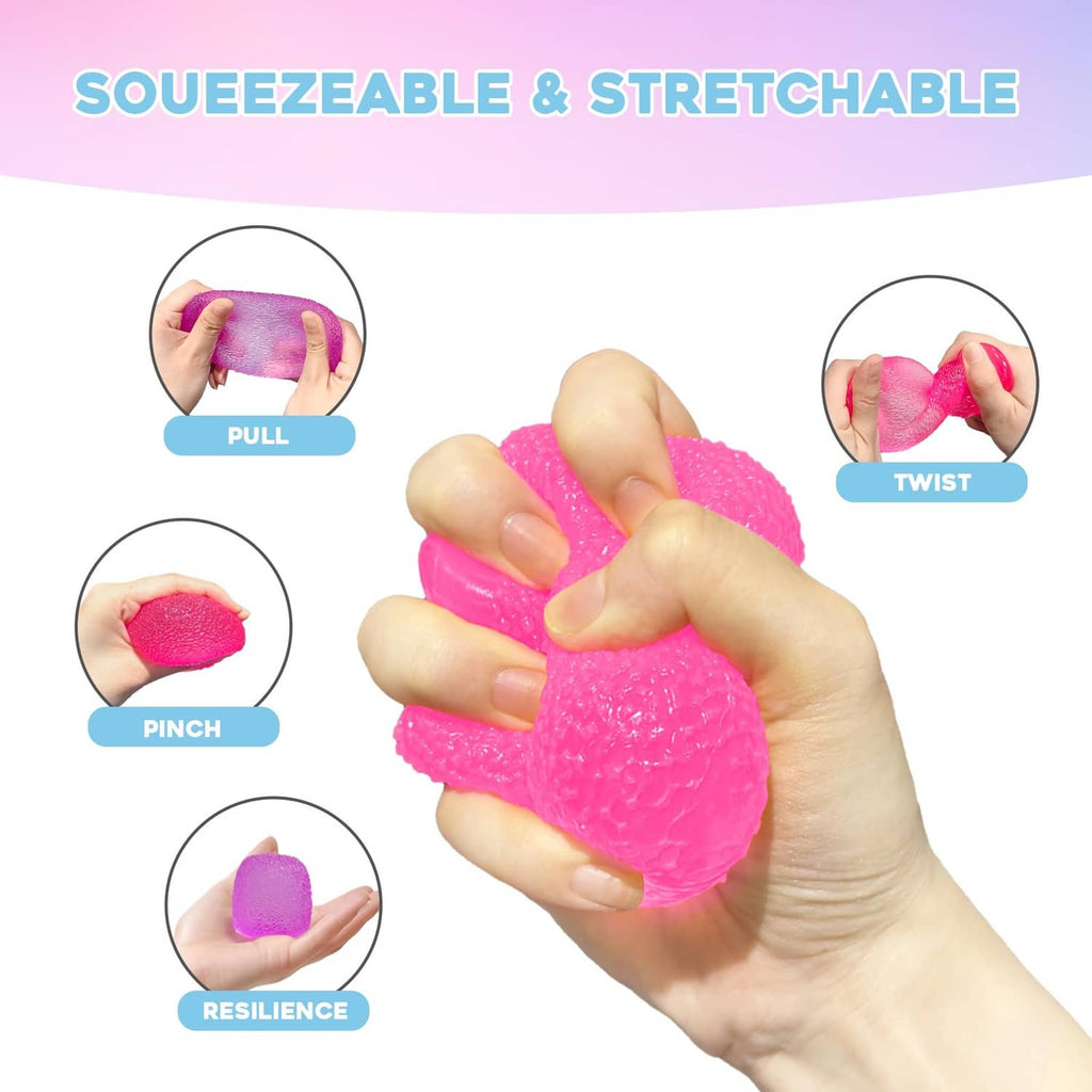 Stretchable pink squishy stress ball squeezed and twisted by a hand