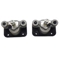 Front brake caliper assembly in gray with black mounting plate and mounting bolts.