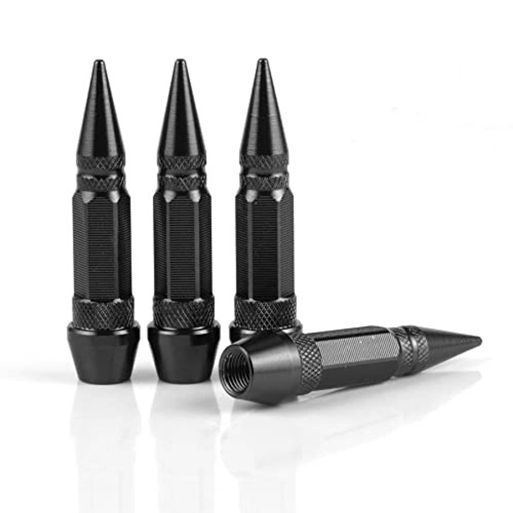 Three black spiked valve caps and one angled, knurled texture, threaded opening