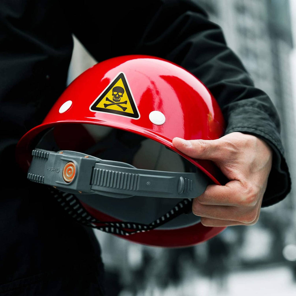 Red hard hat with yellow warning triangle safety sticker