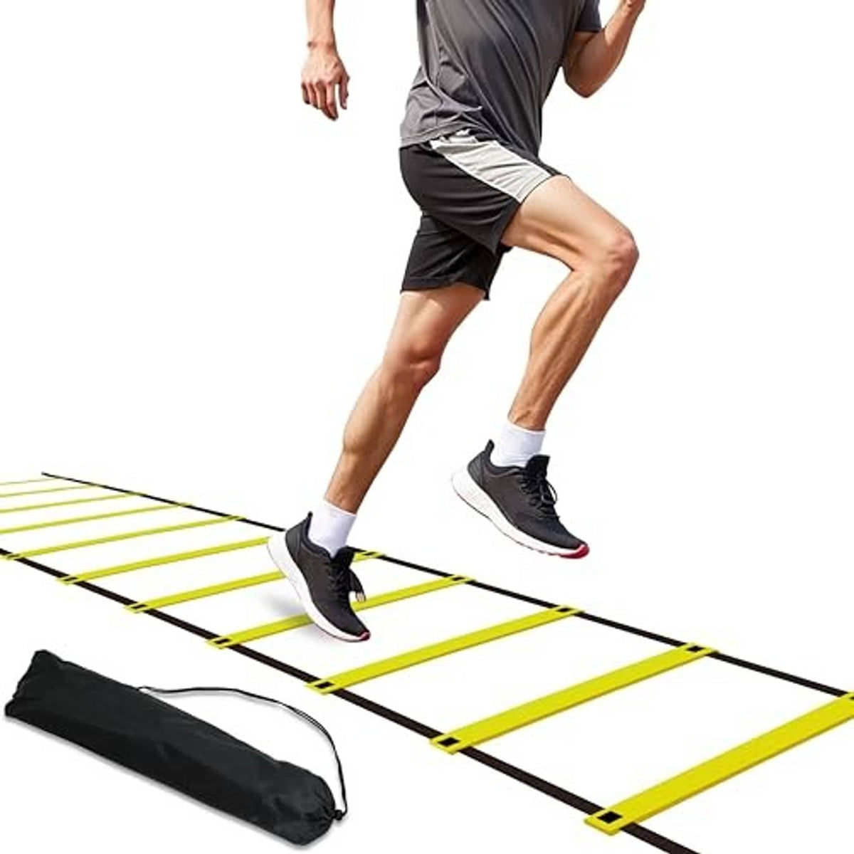 Yellow and black agility ladder with adjustable rungs laid on ground, with carry bag