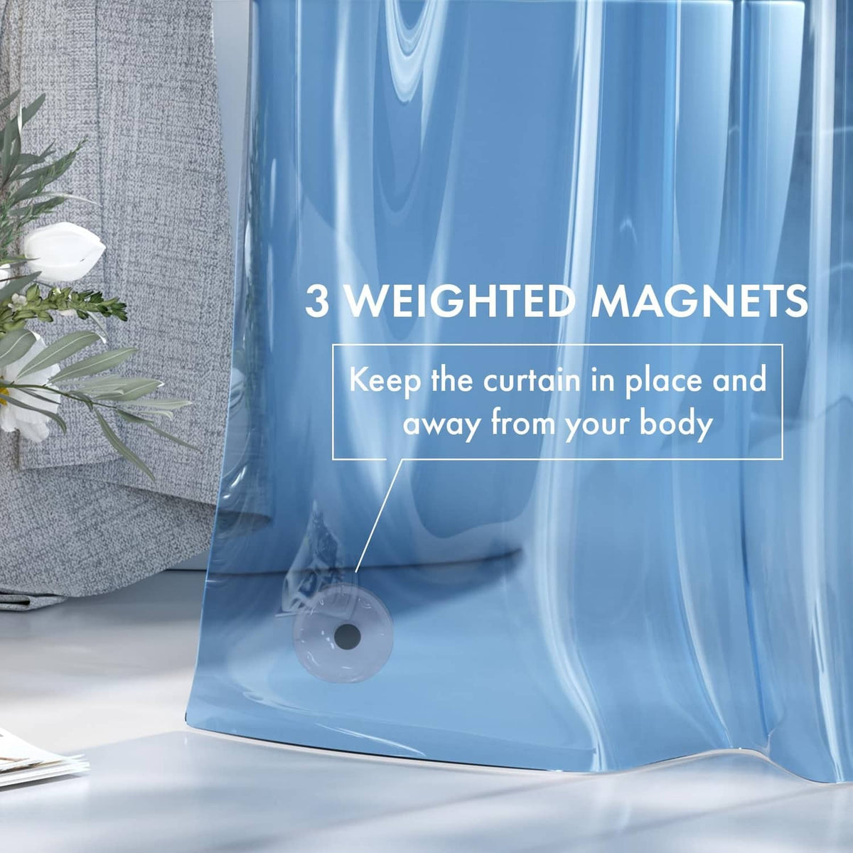 Clear blue shower curtain liner with weighted magnets along the bottom edge