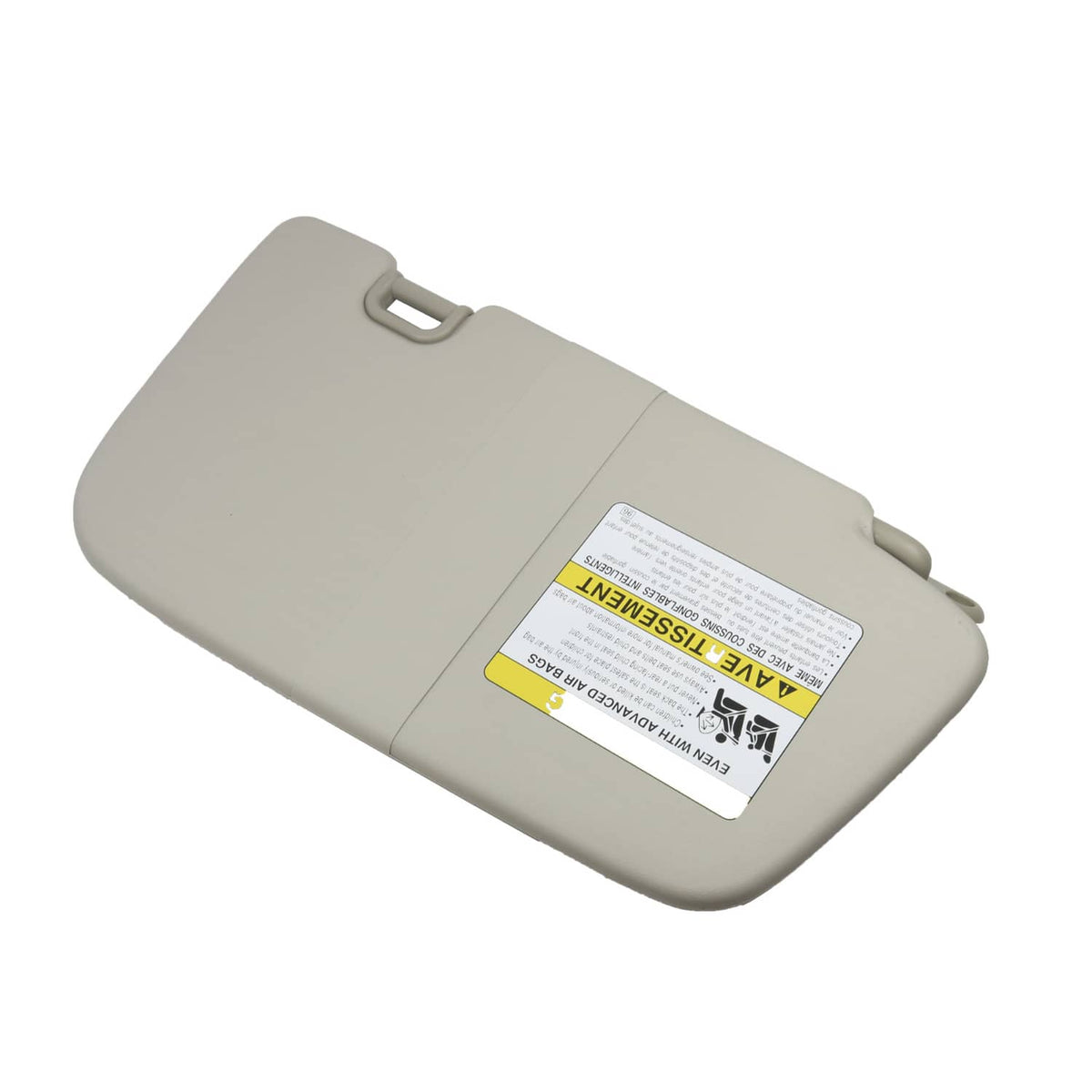 Gray driver-side sun visor with mounting clip and integrated label area