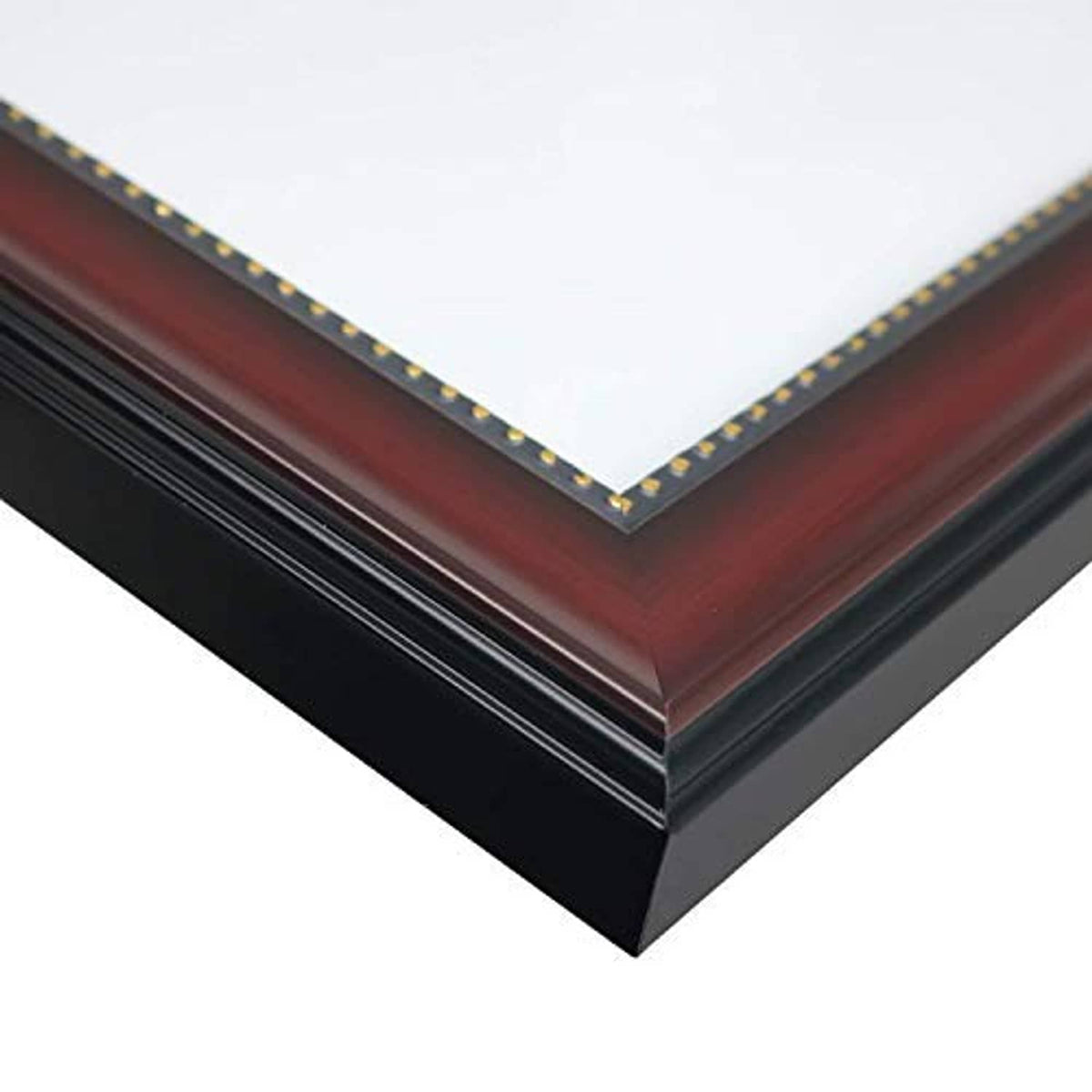Graduation shadow box frame corner detail with dark wood finish and gold stud trim