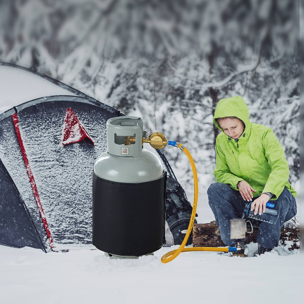 Insulated gas cylinder warmer with black wrap and yellow hose connected to valve