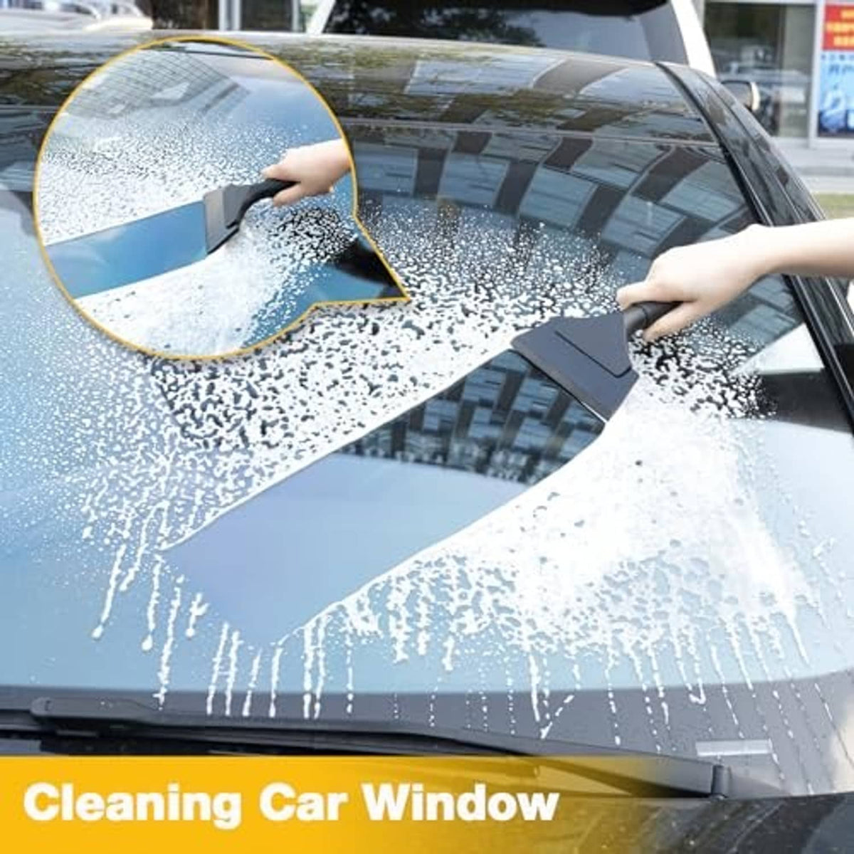 Vinyl wrap squeegee pressing out water and bubbles from car window tint film