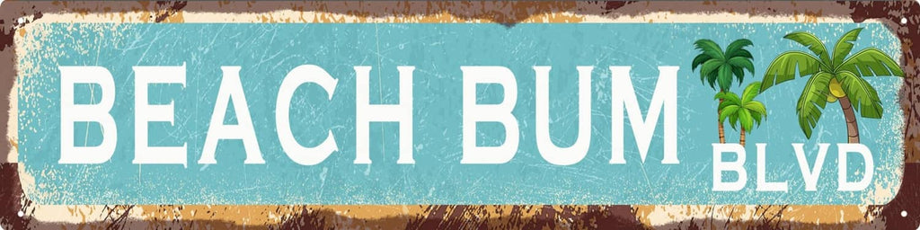 Vintage tin street sign reading “BEACH BUM BLVD” with palm tree graphic