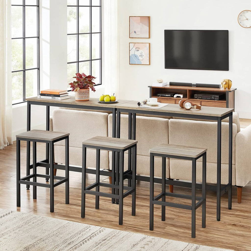Greige bar stool with black metal frame and lower footrest